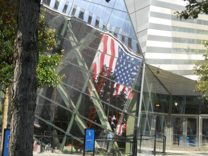 Flag reflecting in a building